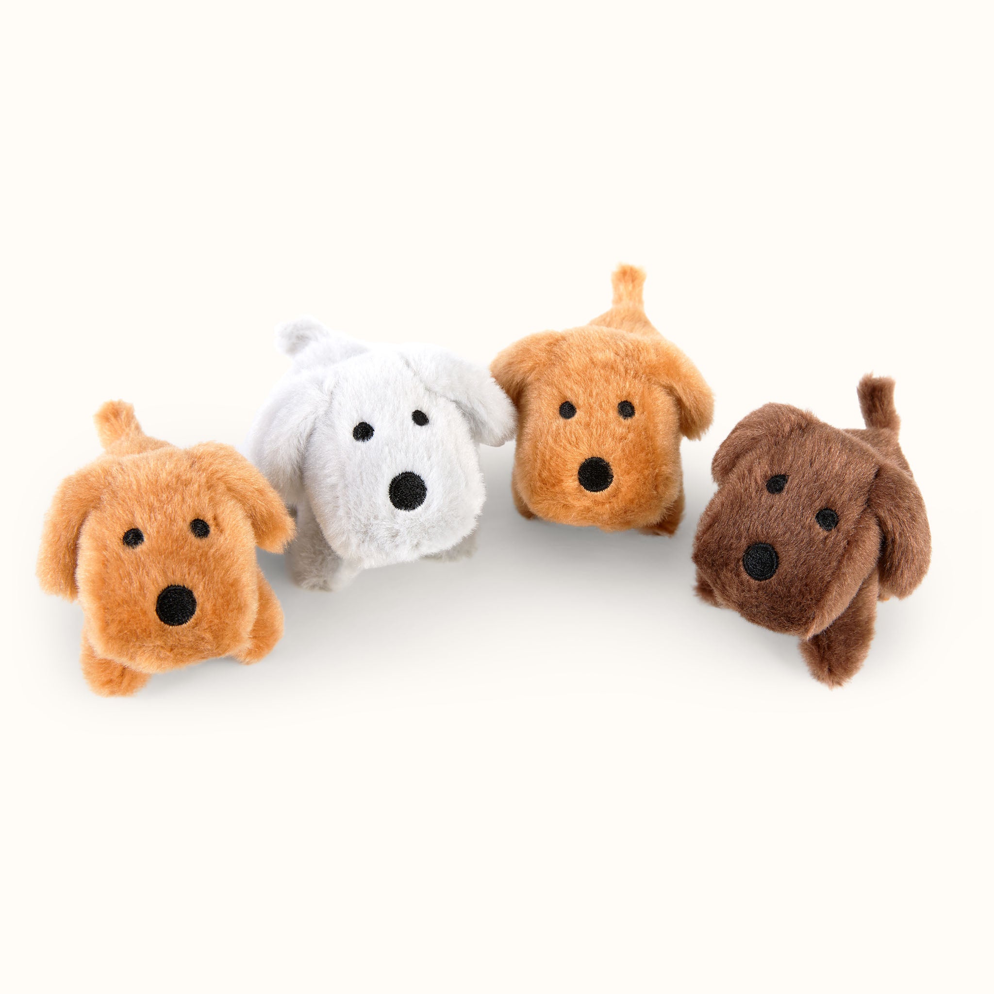 Baby dogs as stuffed cuddly toys 4 cute puppies